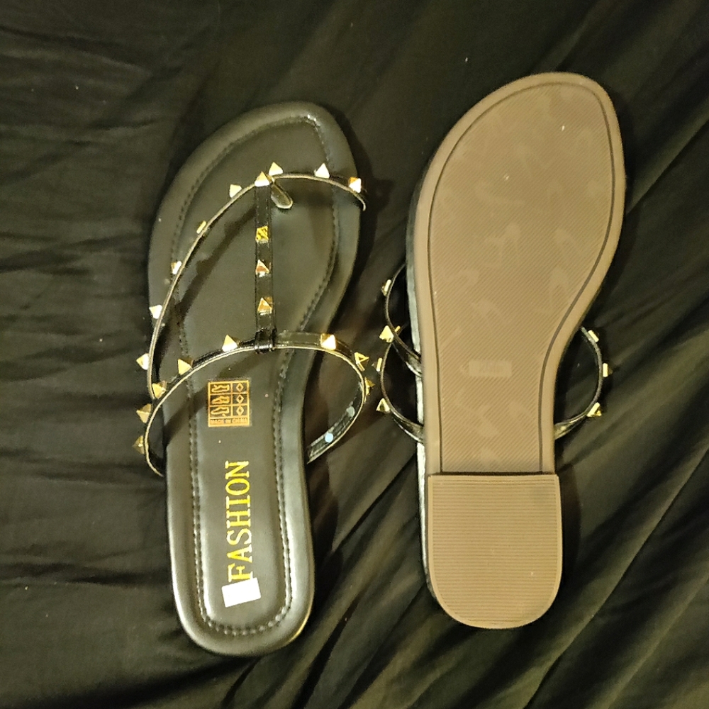 Black/gold stuffed sandals